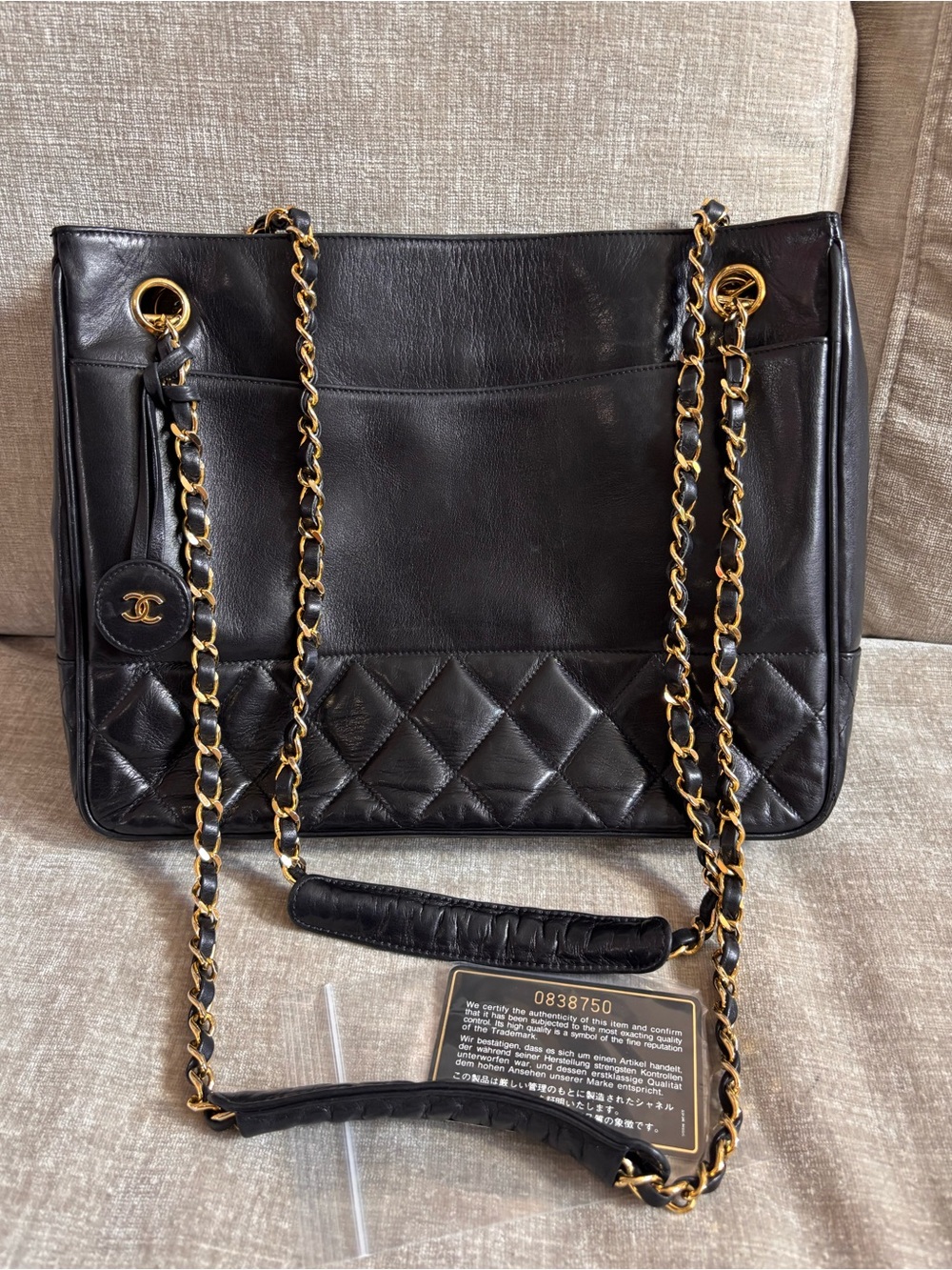 Authentic CHANEL black lambskin vintage charm shoulder bag